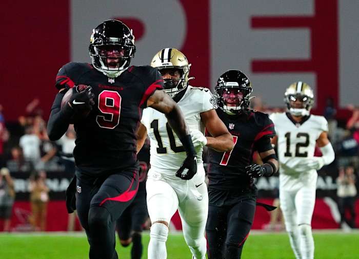 Cardinals Isaiah Simmons (9) returns an interception for a touchdown against the Saints. © Patrick Breen/The Republic / USA TODAY NETWORK